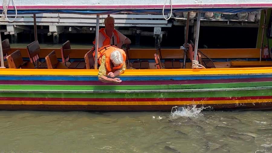 3 Hrs Private boat Tour Bangkok Floating Market by Flat Boat - Wat Pak Nam Phasi Charoen: the 69-meter Buddha and the relic pagoda