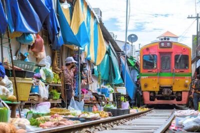 Amphawa Floating Market & Maeklong Railway Train Market Tour - Wat Bang Kung: The temple where banyan trees take over the scene