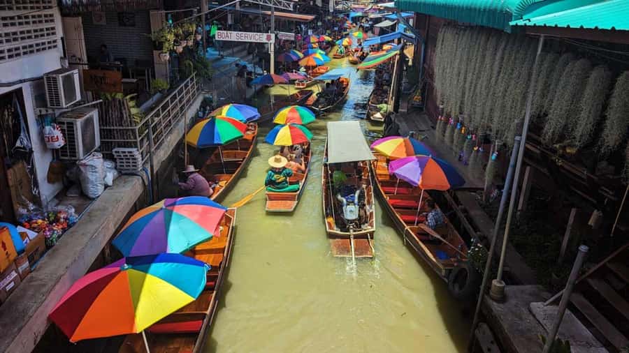 Bangkok: Damnoen Floating Market & Train Market Private Tour - The transfer to the pier: switching from tracks to canals