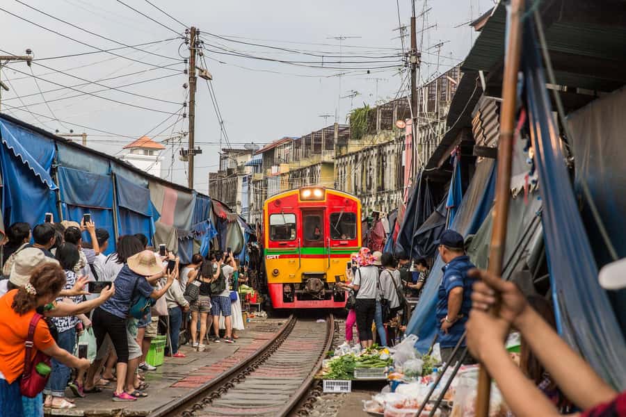 Bangkok: Damnoen Saduak Floating Market & Train Market Tour - From rail to water: the pier transfer that keeps the day smooth