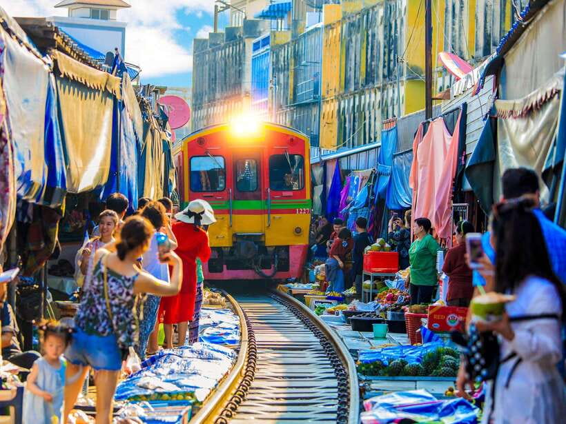 Bangkok: Maeklong Railway & Amphawa Floating Market Day Trip - Maeklong Railway Market: the train you plan for, not just watch