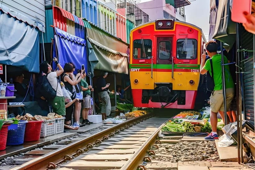 Bangkok: Railway, Floating Market & Chao Phraya Cruise Tour - A smooth 11-hour mix of rail chaos, canal shopping, and river sunset