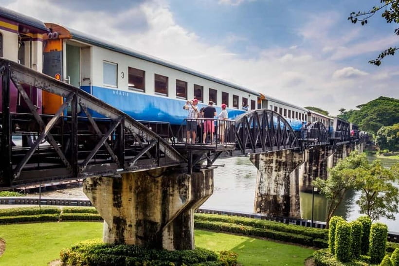 BKK: Damnoen Floating Market, Maeklong Rail & River Bridge - Kanchanaburi War Cemetery and River Kwai: a reflective visit with real emotional weight