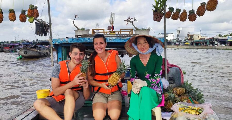 Cai Rang and Phong Dien Floating Market Explore Mekong Delta - Local boat ride + fresh fruit: seeing commerce from the water