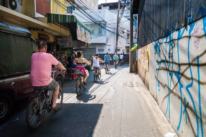 Countryside Bangkok and a Local Floating Market Tour by Bicycle Including Lunch - The Market Stop: Where Thai Snacks Turn into a Walking Meal