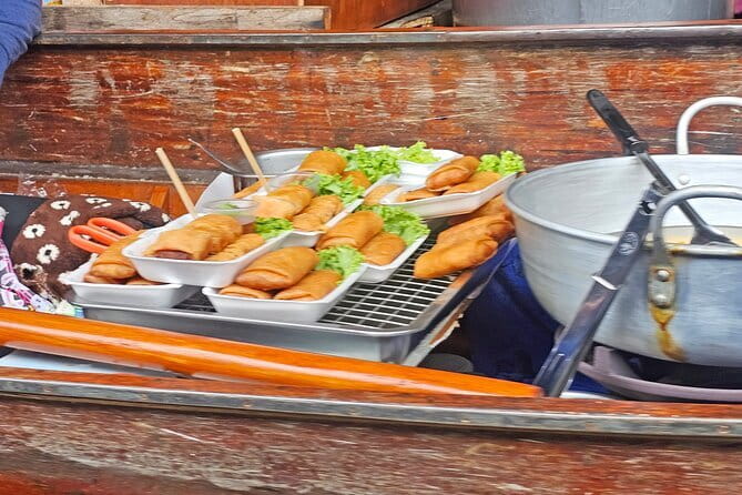 Damnoen Saduak Famous Floating Market and Mea Klong Railway Tour - Why this Bangkok day trip feels like two different Thailand days