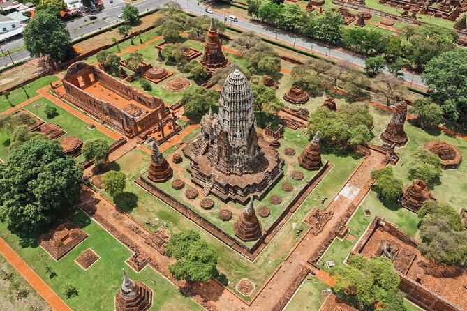 Damnoen Saduak Floating Market & Ayutthaya Tour from Bangkok - Ayutthaya Temples: From Massive Seated Buddha to Royal Chapel Power