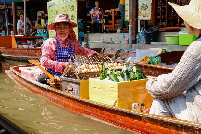 Day Trip to Bangkok Floating Market & Maeklong Railway - Damnoen Saduak Floating Market: boat ride first, then real time to browse