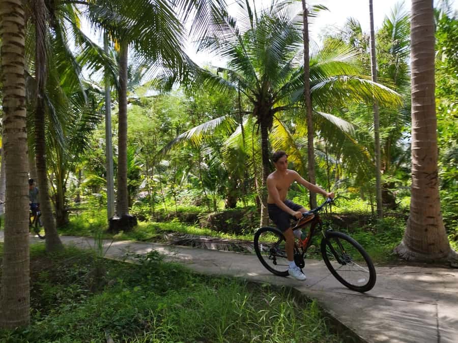 Floating Market Full-Day Bicycle Tour from Bangkok - Cycling in Samut Songkhram: quiet roads, coconut trees, and real texture