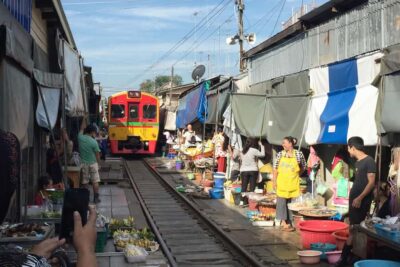From Bangkok: Kanchanaburi Tour with Floating Market Visit - Maeklong Railway Market: the train-in-the-market moment