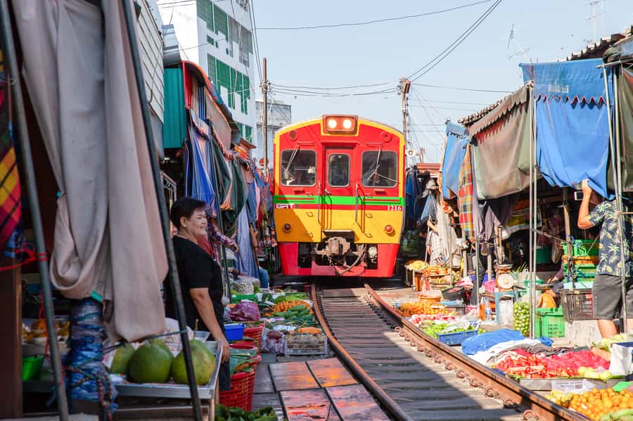 From Bangkok: Maeklong Railway and Floating Market Food Tour - Longtail boat canals: the ride that makes the day feel like Thailand