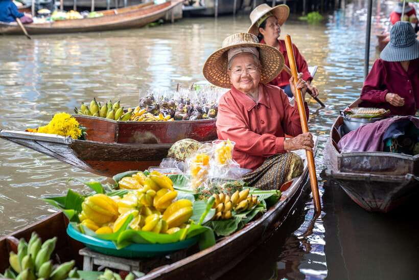 From Bangkok: Railway & Damnoen Saduak Floating Market Tour - Maeklong Railway Market (Talad Rom Hup): Watching the Train Change Everything