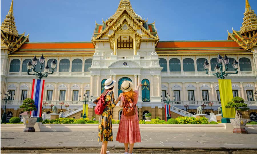 Grand Palace, Damnoen Floating Market & Maeklong Market Tour - Talat Rom Hup: the Maeklong Railway Market train moment