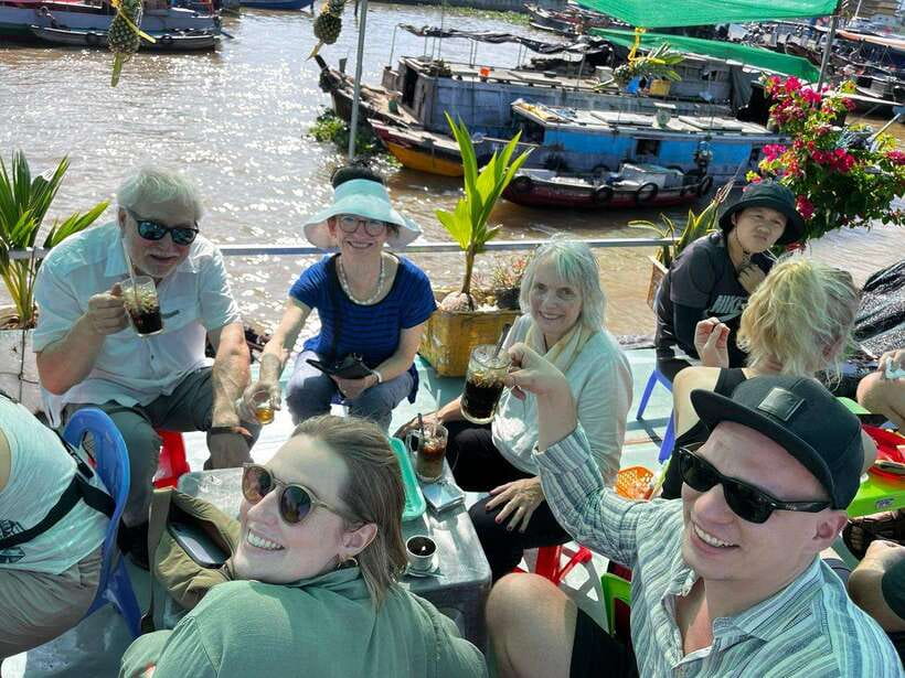 Ho Chi Minh: 1 Day Can Tho Floating Market & Cu Chi Tunnels - Hu tieu workshop and pineapple on the boat